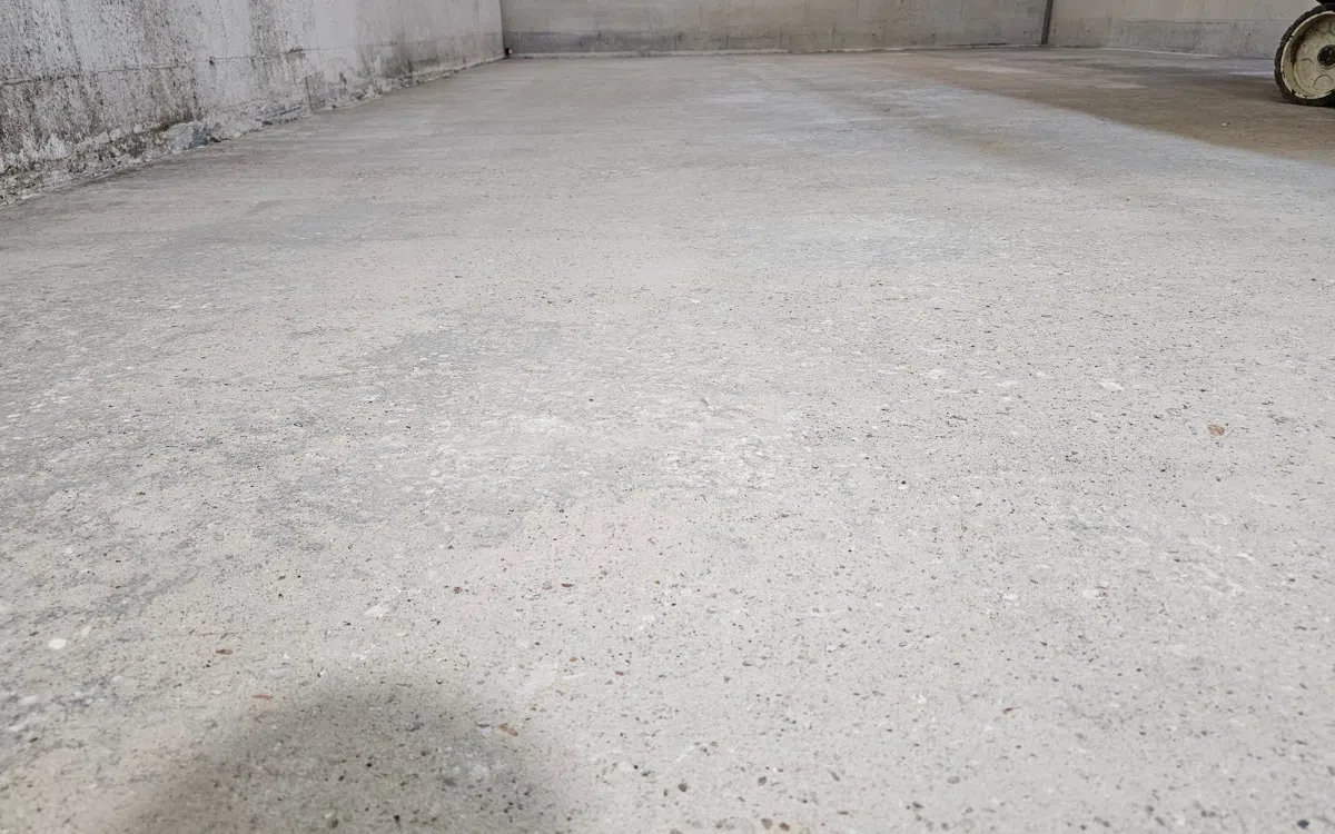 Professional restoration of a worn concrete floor